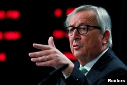 FILE - European Commission President Jean-Claude Juncker holds a news conference at the EU Commission headquarters in Brussels, Belgium, May 7, 2019.