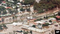 Drenching rains unleashed by a tropical cyclone have left vast tracts of Queensland state under water, Australia, 29 Dec 2010