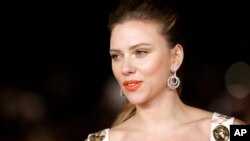 FILE - Actress Scarlett Johansson arrives for the screening of the film 'Her' at the 8th edition of the Rome International Film Festival in Rome, Nov. 10, 2013.