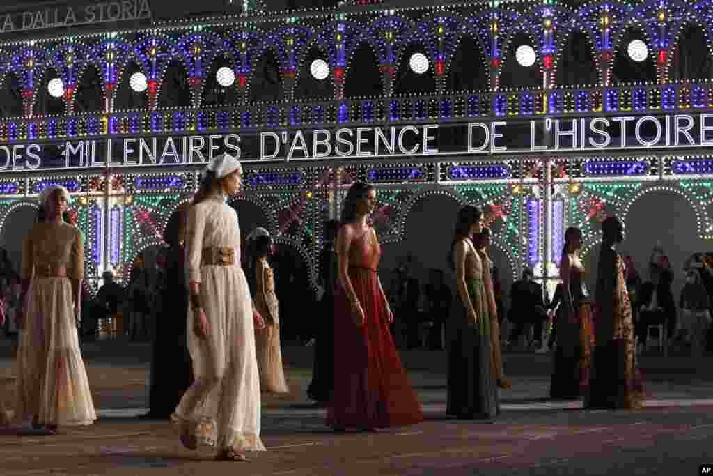 Models wear creations during the unveiling of the Dior 2021 cruise collection in Lecce, southern Italy, July 22, 2020.