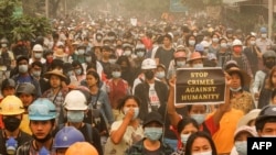 2021年3月28日，緬甸的抗議者參加反對軍事政變的示威遊行。（照片由匿名人士通過臉書提供給法新社。）