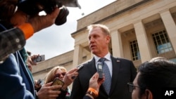 FILE - Acting Defense Secretary Patrick Shanahan talks to reporters at the Pentagon, March 18, 2019.
