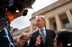 Acting Defense Secretary Patrick Shanahan talks to the media before the arrival of French Defense Minister Florence Parly at the Pentagon, March 18, 2019.