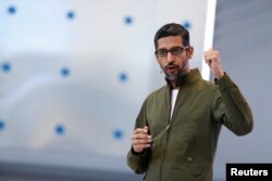 FILE - Google CEO Sundar Pichai speaks on stage during the annual Google I/O developers conference in Mountain View, California, May 8, 2018.