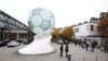 Media wait outside the headquarters of the German soccer federation DFB in Frankfurt, Germany, Nov. 3, 2015. 