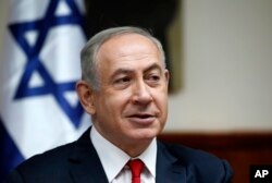 Israeli Prime Minister Benjamin Netanyahu attends the weekly cabinet meeting in Jerusalem, Jan. 22, 2017.