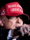 Presiden AS Donald Trump berpidato dalam rapat umum Make America Great Again di Bandara Richard B. Russell di Roma, Georgia pada 1 November 2020. (Foto: Brendan Smialowski/AFP)