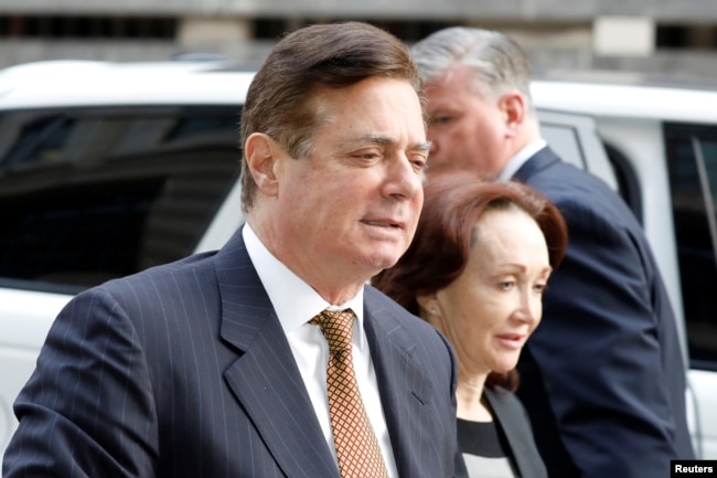 FILE - U.S. President Trump's former campaign chairman Paul Manafort arrives at a hearing at U.S. District Court in Washington.