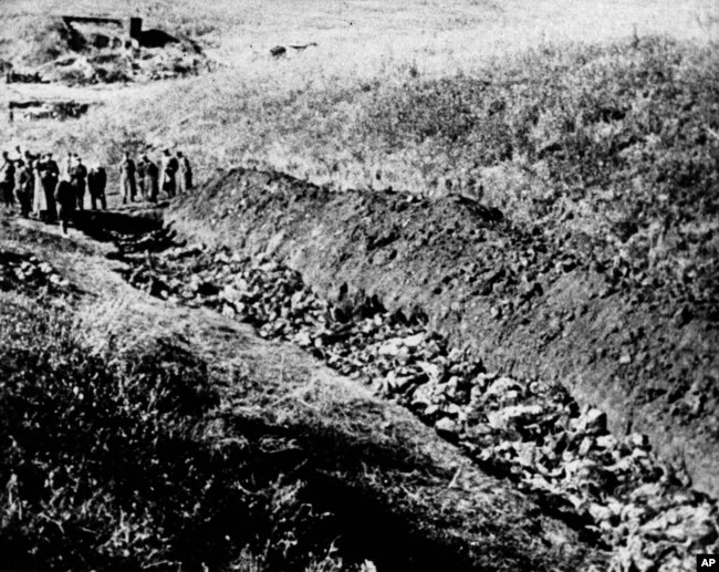 FILE - This a 1944 file photo of part of the Babi Yar ravine at the outskirts of Kiev, Ukraine where the advancing Red Army unearthed the bodies of 14,000 civilians killed by fleeing Nazis, 1944. Ukrainians have marked the 75th anniversary of the Babi Yar massacre, one of the most infamous mass slaughters of World War II. (AP Photo, file)