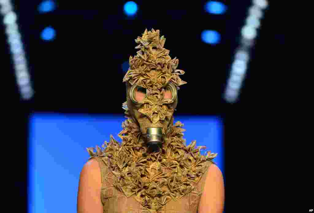 A model presents a creation at the Irene Luft show during the Mercedes-Benz Fashion Week in Berlin, Germany, July 4, 2013.