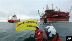 Greenpeace activists near Russian energy giant Gazprom's Arctic oil platform, Prirazlomnaya, in the Pechora Sea, Aug. 24, 2012.