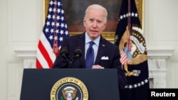 Presiden AS Joe Biden saat memberi paparan di Gedung Putih, Washington, Selasa, 4 Mei 2021. (Foto: Jonathan Ernst/Reuters)