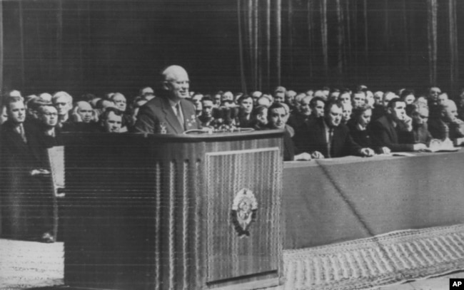 FILE - Soviet leader Nikita Khrushchev addresses a huge rally in the Lenin sports stadium in Moscow, April 10, 1958.