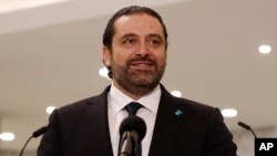 Newly-assigned Lebanese Prime Minister Saad Hariri smiles as he speaks to journalists at the presidential palace in Baabda, east of Beirut, Lebanon, Nov. 3, 2016. 