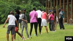 Golf is slowly gaining popularity in Nigeria. Every Saturday, young people take lessons at the IBB International Golf and Country Club in the Nigerian capital of Abuja. Uloma Mbuko is the lead instructor. (C. Oduah/VOA)
