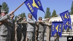 US servicemen attend a change of command ceremony at Manas Air Base near Kyrgyzstan's capital Bishkek, June 2009. (file photo)