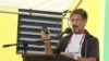 FILE -John McAfee speaks at a ceremony for the official presentation of equipment at the San Pedro Police Station in Ambergris Caye, Belize. 
