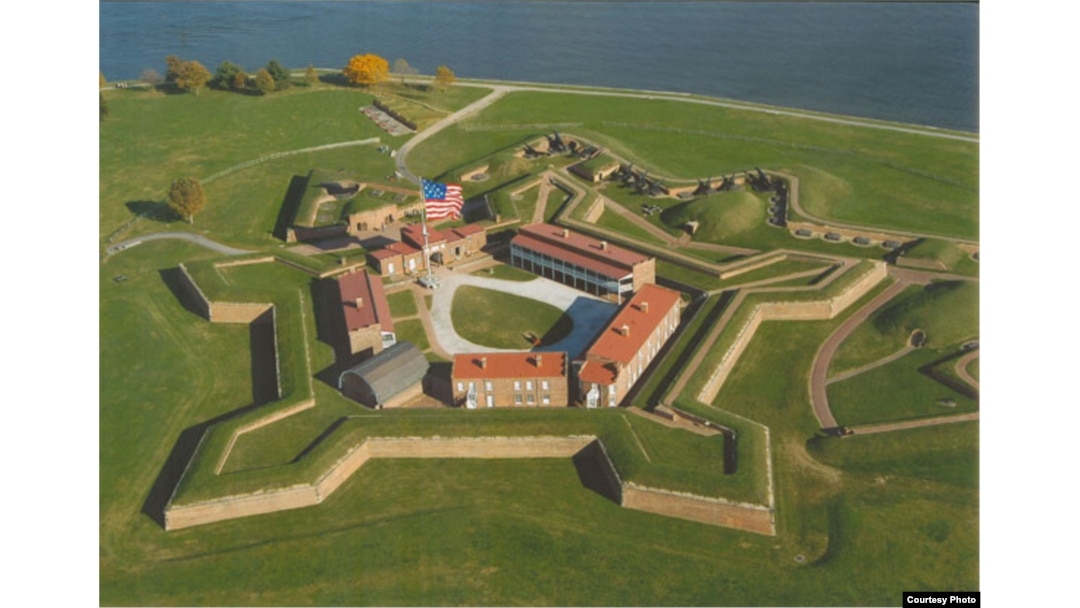 An aerial view of Fort McHenry. The 15-star flag shown is current, but it approximates the oversized flag that flew over the fort during the fateful bombardment of 1814. (National Park Service)