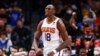 L'attaquant des Phoenix Suns, Bismack Biyombo, célèbre après un dunk pendant la deuxième mi-temps d'un match de basket-ball NBA contre les Dallas Mavericks, jeudi 20 janvier 2022, à Dallas.