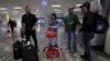 Stranded Cuban Migrants Begin Arriving in US 