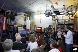 Democratic presidential candidate Sen. Bernie Sanders of Vermont meets with volunteers during a canvass lunch in Charles City, Iowa, Jan. 30, 2016.