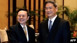 2014年2月陆委会主委王郁琦(左)和国台办主任张志军在南京紫金山宾馆会晤(资料照片)