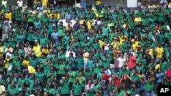 African National Congress supporters cheer before the start of their party's 100th anniversary celebrations in Bloemfontein, South Africa, January 8, 2012.