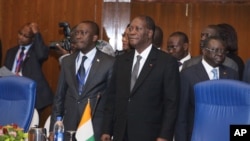 Ivory Coast President Alassane Quattara (r) is Chairman of ECOWAS Authority of Heads of State and Government.