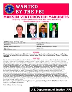 This poster provided by the U.S. Department of Justice shows Maxsim Yukabets. Yakubets, 33, is best known as co-leader of a cybergang that calls itself Evil Corp