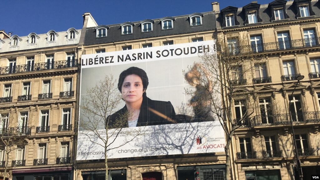عکس بزرگ نسرین ستوده وکیل زندانی بر روی ساختمان کانون وکلای فرانسه در پاریس
