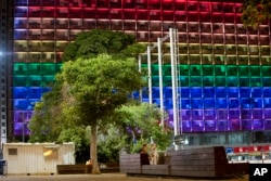 FILE - Tel-Aviv city hall lit up with rainbow flag colors in solidarity with victims of Pulse Orlando shooting, Israel, June 12, 2016.