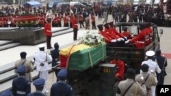 The coffin of the late Ghanaian President John Atta Mills is transported in Accra, Ghana, August 10, 2012.