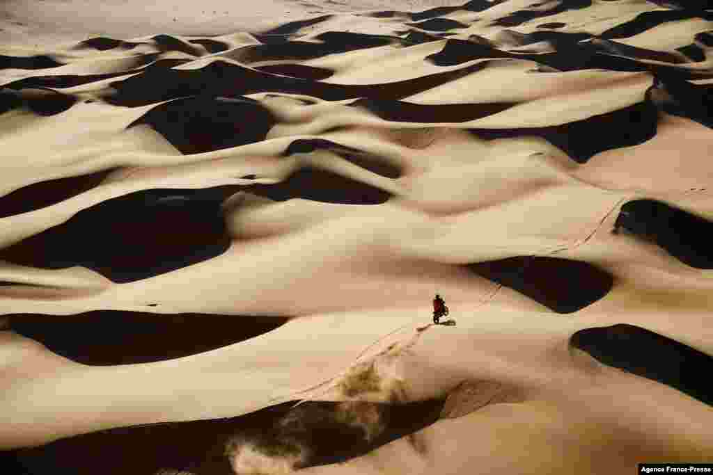 US biker Ricky Brabec powers his Honda during the Stage 8 of the Dakar Rally 2022 between al-Dawadimi and Wadi Ad-Dawasir in Saudi Arabia.