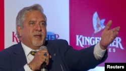 FILE - Kingfisher Airlines Chairman Vijay Mallya speaks to the media during a news conference in Mumbai, Nov. 15, 2011. 