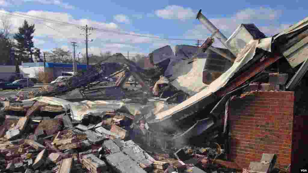 This beauty supply store was completely destroyed as a result of the violence that followed the grand jury annoucement in Ferguson, Missouri, Nov. 25, 2014. (Kane Farabaugh/VOA)