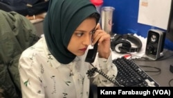 WHBF-TV Reporter Tahera Rahman works the phones to set up a potential news story.