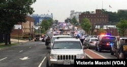 Law enforcement responds to reports of an active shooter at the US Navy Yard in Washington July 2, 2015