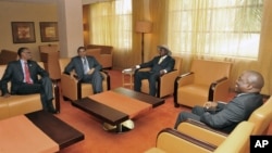 Rwanda President Paul Kagame, left, Tanzania President Jakaya Kikwete, Uganda President Yoweri Museveni, and DRC President Joseph Kabila, at the opening of the International Great Lakes Conference, Aug. 7, 2012