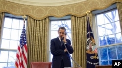 US President Barack Obama discusses the START treaty, during a phone call with his Russian counterpart Dmitry Medvedev in the Oval Office , 26 Mar 2010