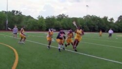 Members of the lacrosse team practice at Ballou High School in Washington