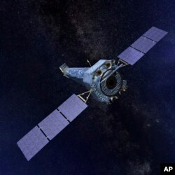 This illustration made available by NASA shows the Chandra X-ray Observatory. On Oct. 12, 2018, the space agency said that the telescope automatically went into so-called safe mode on Oct. 10, possibly because of a gyroscope problem.