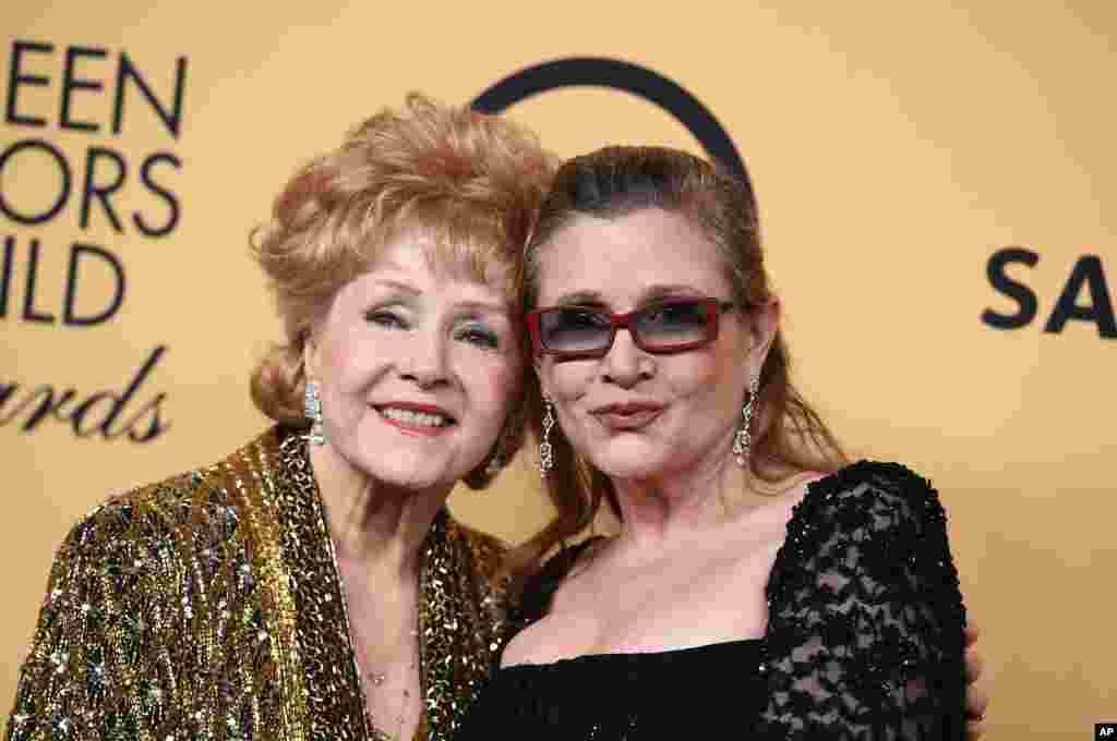 U.S. film actress Debbie Reynolds, 84, (left), died, Dec. 28, 2016, after suffering a stroke, one day after her film star daughter, Carrie Fisher, (right) died of a heart attack. 