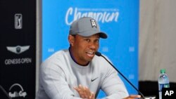 Tiger Woods talks about his charitable works off the course and his return to competitive golf in the Genesis Open at Riviera Country Club after an absence of 12 years, at the course in the Pacific Palisades area of Los Angeles, Feb. 13, 2018.