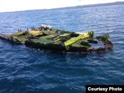 This is the Japanese boat wreckage that was recovered off of Newport, Oregon, last April with a school of non-native fish inside its hull. (Photo courtesy of John Chapman, OSU-HMSC)