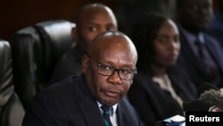 Kenya's Attorney General Githu Muigai speaks during a press conference in Nairobi, Kenya, Sept. 22, 2017.