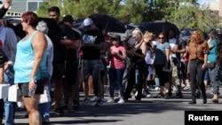 Hundreds of people queue to donate blood