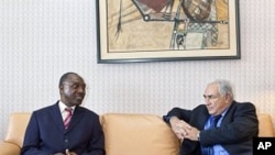 International Monetary Fund Managing Director Dominique Strauss-Kahn (R) meets with Philippe Henri Dacoury-Tabley, governor of the BCEAO, the West African central bank, in Abidjan (File Photo).