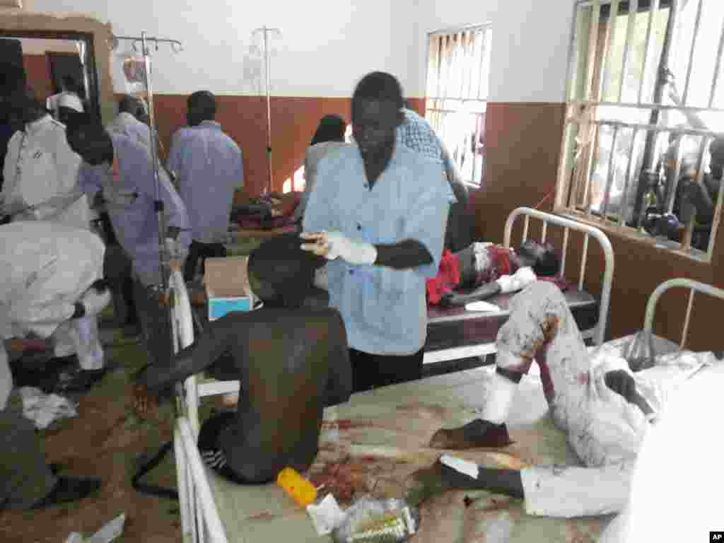 Survivors say a suicide bomber disguised in a school uniform detonated explosives at a high school assembly, Potiskum, Nigeria, Nov. 10, 2014. 