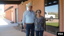 Jim and Sue Chilton on their porch in Arivaca, Arizona, July 21, 2016. (G. Flakus/VOA)