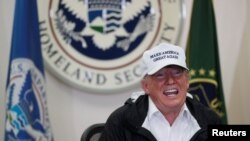 U.S. President Donald Trump speaks during a roundtable discussion with officials after arriving for a visit to the U.S.-Mexico border at McAllen-Miller International Airport in McAllen, Texas, Jan. 10, 2019.